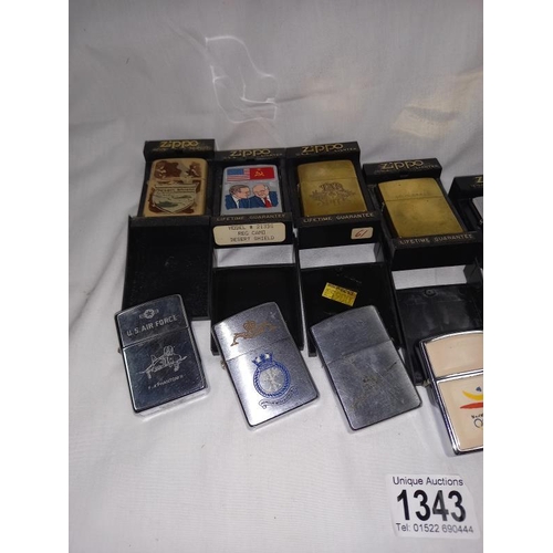 1343 - A good collection of Zippo lighters including rare example