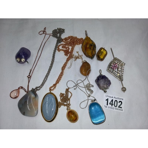 1402 - A selection of old stone necklaces, 6 with neck chains and other items. 11 in total.