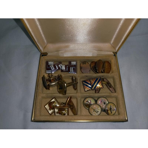 1403 - A collection of cuff links etc.