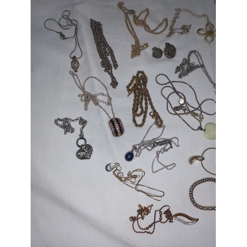 1410A - Approximately 30 items of necklaces etc, small amount of silver items all in good order.