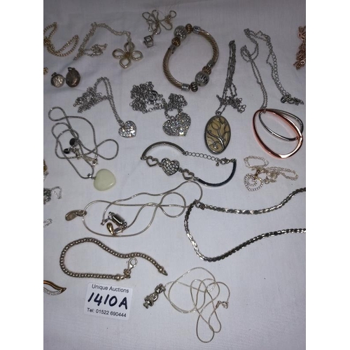 1410A - Approximately 30 items of necklaces etc, small amount of silver items all in good order.