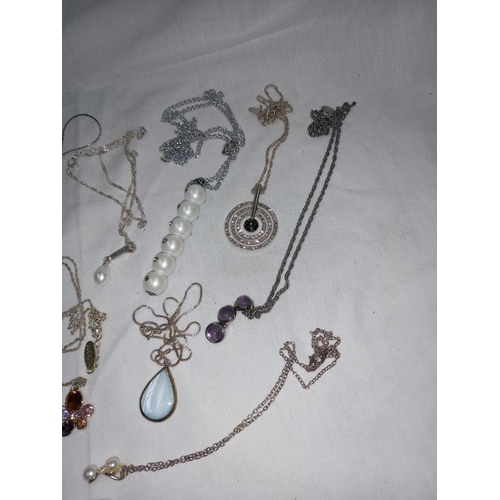 1411 - A quantity of good silver coloured jewellery, all in good order including necklaces etc. 12 items in... 