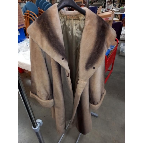 1430 - Approximately 9 items of imitation fur coats etc.