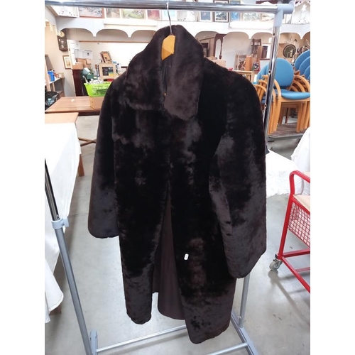 1430 - Approximately 9 items of imitation fur coats etc.