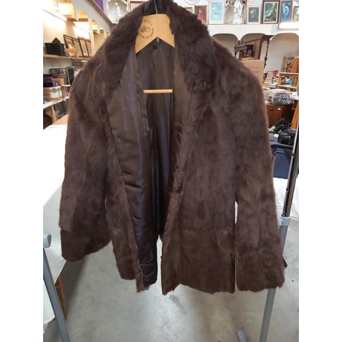 1430 - Approximately 9 items of imitation fur coats etc.