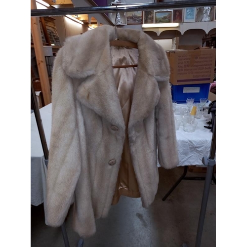 1430 - Approximately 9 items of imitation fur coats etc.