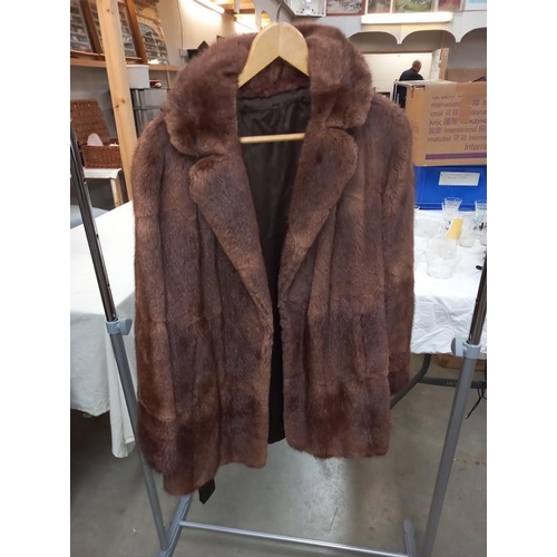 1430 - Approximately 9 items of imitation fur coats etc.