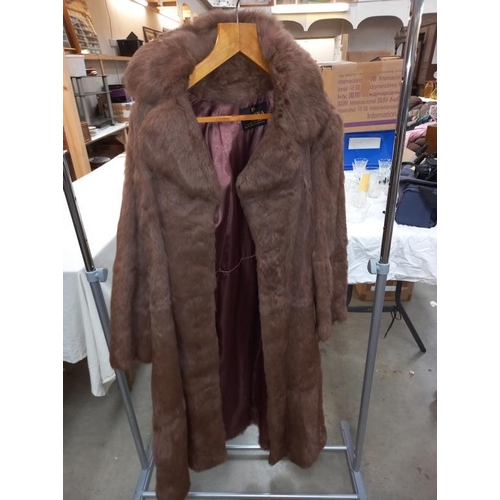 1430 - Approximately 9 items of imitation fur coats etc.