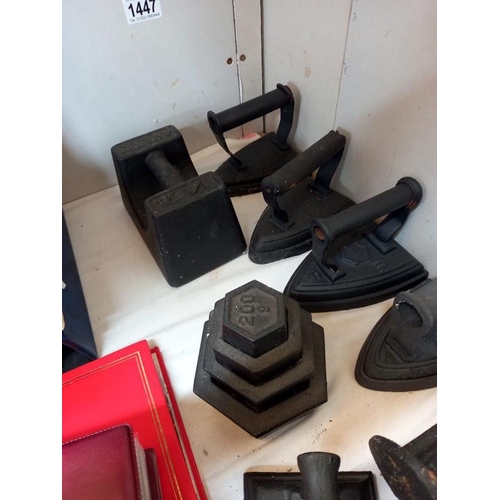 1447 - A quantity of cast iron items including cobblers stay & weights & a meat grinder.
Collect Only.