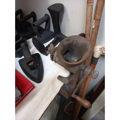 1447 - A quantity of cast iron items including cobblers stay & weights & a meat grinder.
Collect Only.