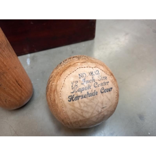 1452 - A vintage Louisville slugger & early Grady soft ball