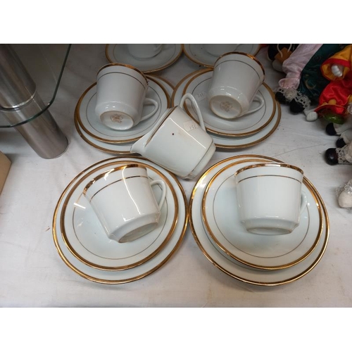 1456 - A gilt edged white china tea set with milk jug (setting for 6)