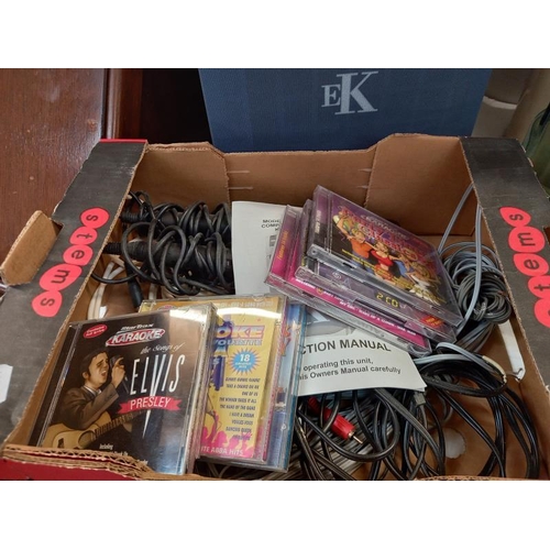 1471 - A compact disc karaoke system with 2 microphones, instructions, wires & some karaoke CD's (system mo... 