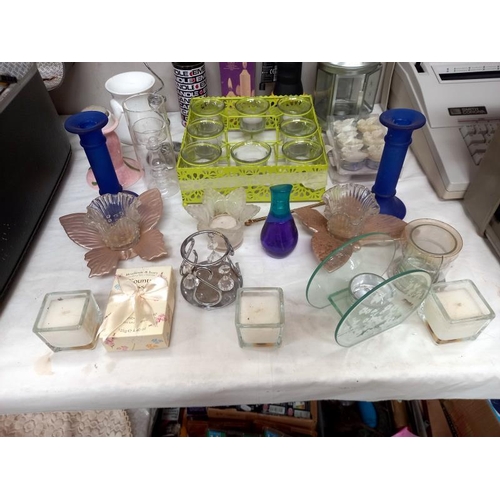 106 - A quantity of miscellaneous including candle holders etc