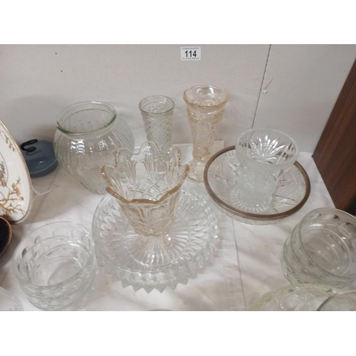 114 - A quantity of glassware including vases. Collect only