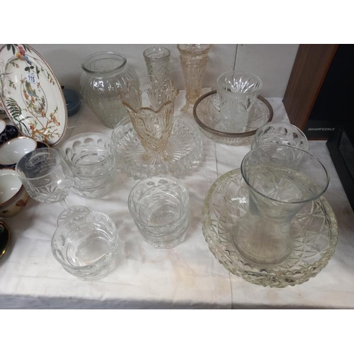 114 - A quantity of glassware including vases. Collect only