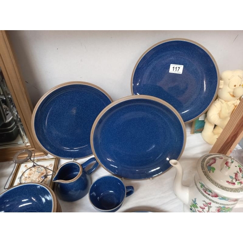 117 - A quantity of blue plates, milk jug, sugar bowl etc.