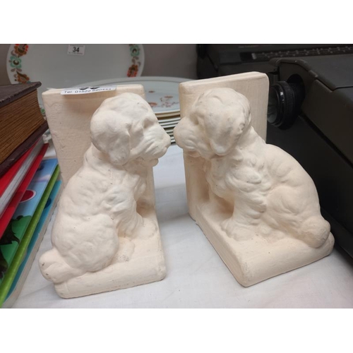 35 - A pair of plaster dog bookends