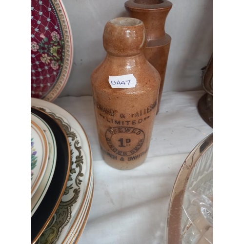 43 - 3 stoneware bottles, one labelled 'Ginger beer - Norwich and Swaffham'