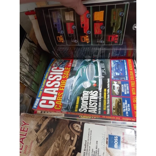 54 - A quantity of classic car magazines including Austin Healey parts catalogue