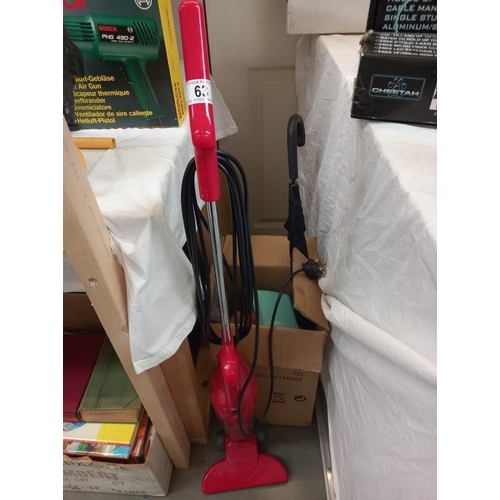 63 - An electric Royale senior vacuum cleaner, a walking stick umbrella and a box of brushes and pans