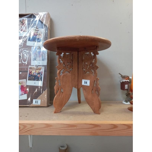 84 - A small carved wood stand (31cm diameter x 31cm height ) COLLECT ONLY