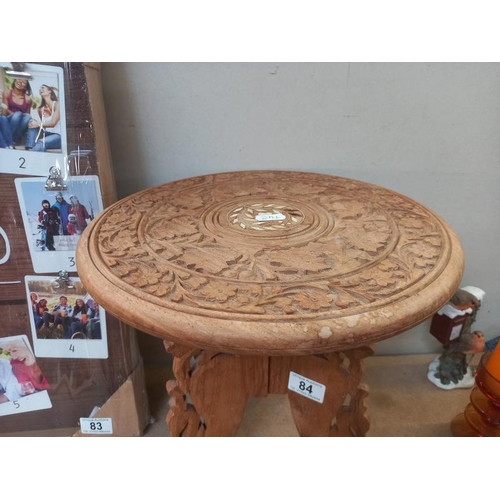 84 - A small carved wood stand (31cm diameter x 31cm height ) COLLECT ONLY