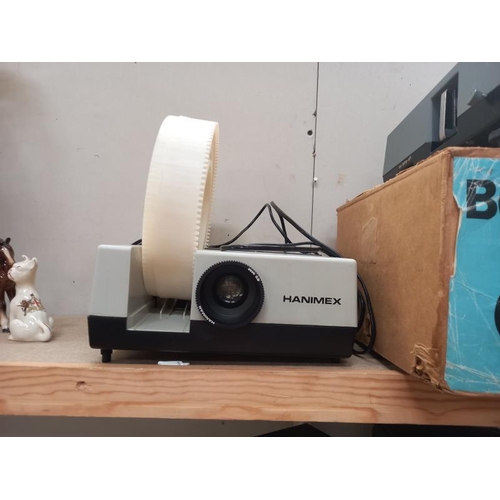 97 - A quantity of projectors including Hanimex COLLECT ONLY