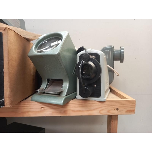 97 - A quantity of projectors including Hanimex COLLECT ONLY