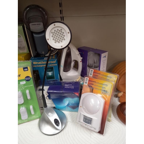 162 - Some useful household electronic goods including CD player, lights (artificial sunlight), security i... 