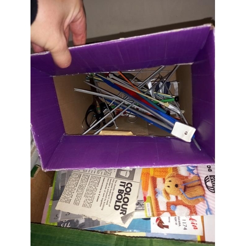 164 - A box of knitting patterns and knitting needles