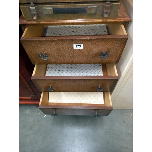 173 - A small 3 drawer chest on pad feet