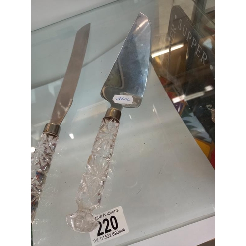 220 - A pair of cake servers with cut glass handles