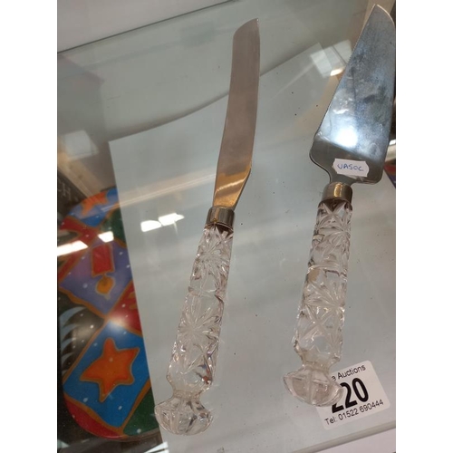 220 - A pair of cake servers with cut glass handles