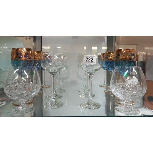 222 - A quantity of boxed drinking glasses including wine and brandy glasses