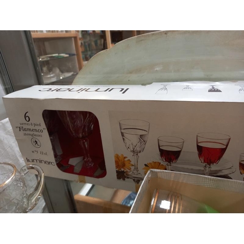 222 - A quantity of boxed drinking glasses including wine and brandy glasses