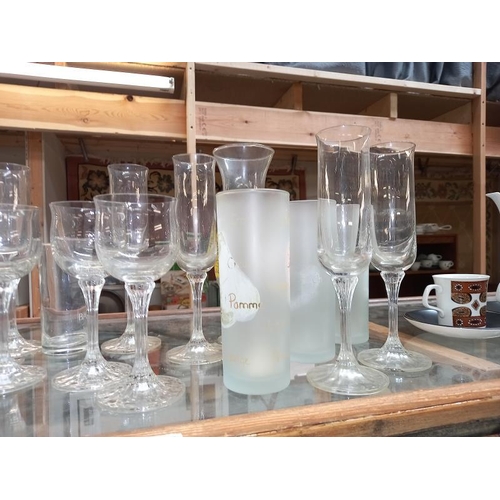 233 - A collection of tall drinking glasses