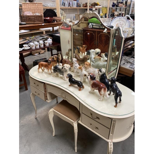 407 - A white serpentine front French style triple mirrorred dressing table and stool