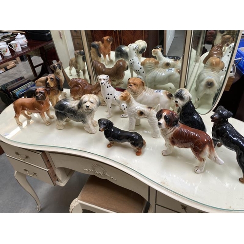 408 - A quantity of dog figurines