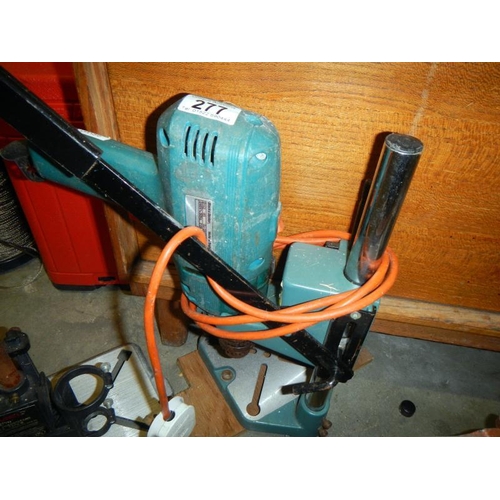 277 - An electric drill in drilling post & 1 drill pillar, an electric horizontal planer & manual grinding... 