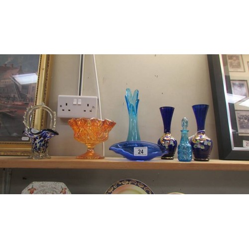 24 - A pair of blue glass hand painted vases and other glassware.