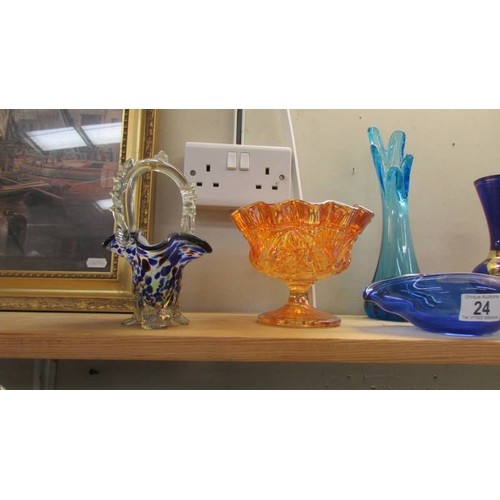 24 - A pair of blue glass hand painted vases and other glassware.