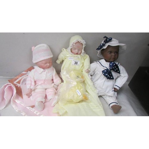 30 - An Ashton Drake Newborn baby doll and two others.