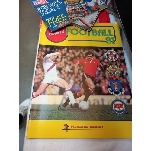 13 - A selection of vintage football related ephemera including Shouts star of the world Paninis football... 