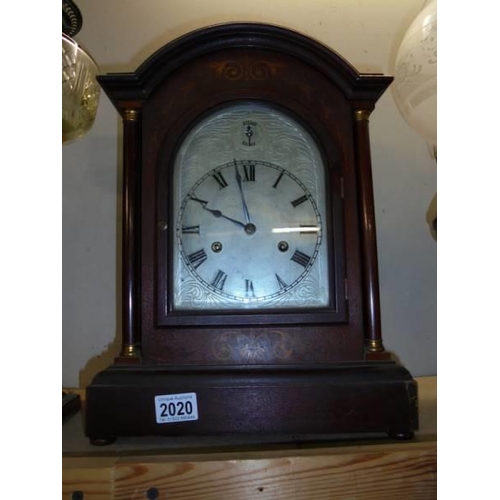 2020 - A mahogany inlaid 8 day bracket clock.