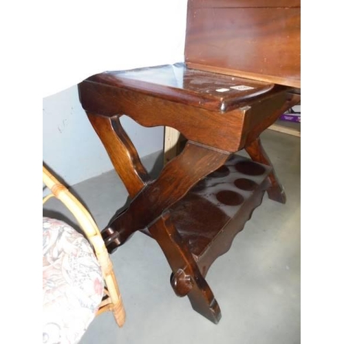 2026 - An oak hall table with stretcher base. COLLECT ONLY.