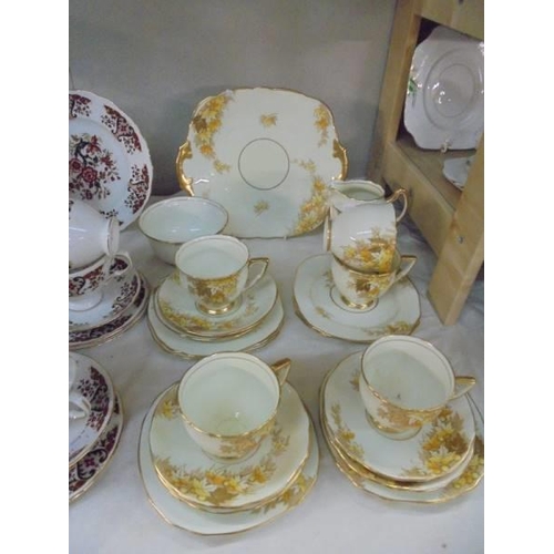 2033 - A Colclough part tea set and a Royal Stafford part tea set.