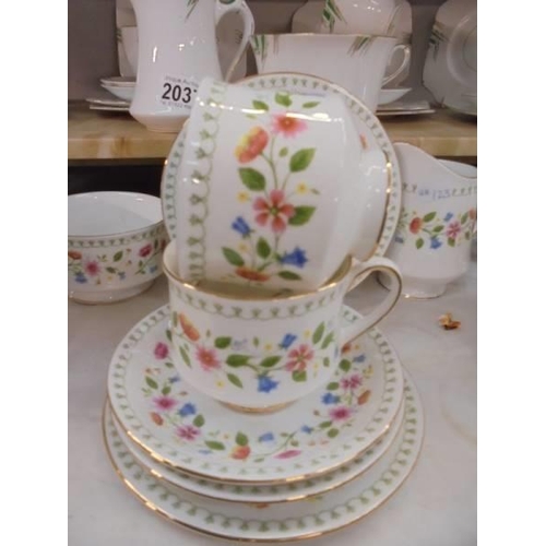 2038 - 20 pieces of Paragon 'Anastasia' pattern tea ware.