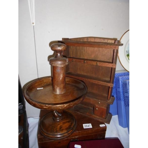 2047 - A mahogany writing box, an oak cake stand and a miniature oak dresser.