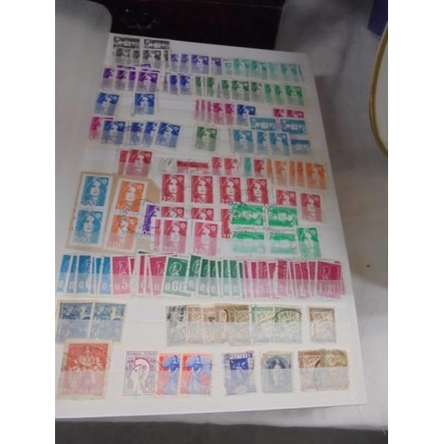 2048 - 2 well stocked albums of French/French possessions stamps.
